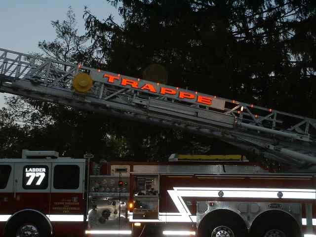 Ladder 77 operating at an acquired structure on 7th Ave. in Trappe